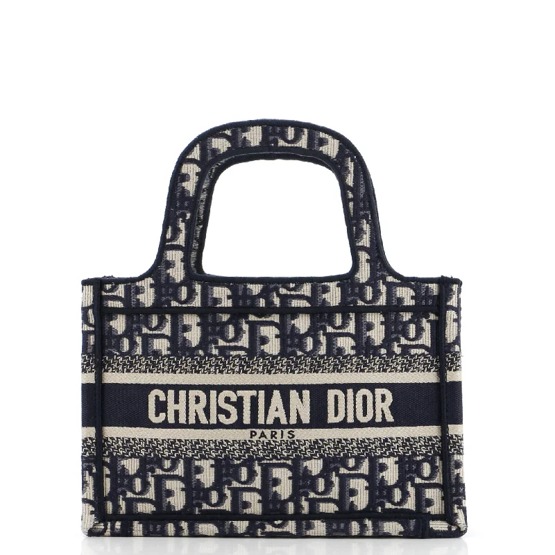 Christian Dior bags with a side - pocket for holding a water bottleBook Tote Oblique Canvas Mini