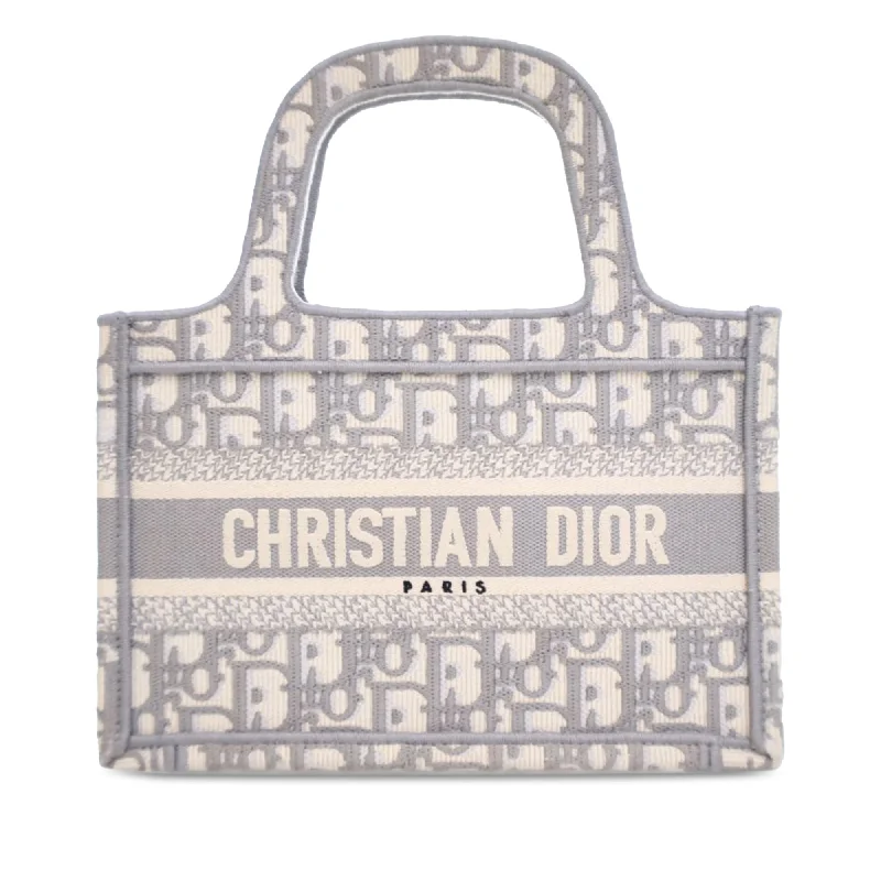 Christian Dior Saddle bags with a distressed leather finishGray Dior Mini Oblique Book Tote Handbag