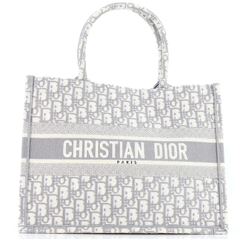 Christian Dior Saddle bags with a distressed leather finishBook Tote Oblique Canvas Medium