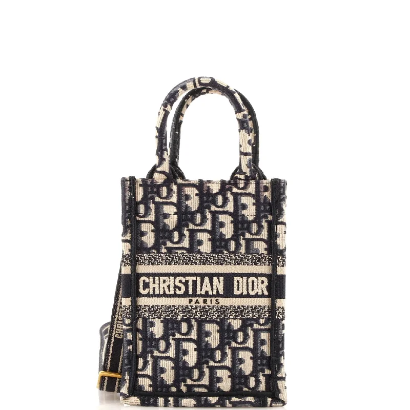 Contemporary Christian Dior handbags with a unique shapeBook Tote Phone Bag Oblique Canvas Mini