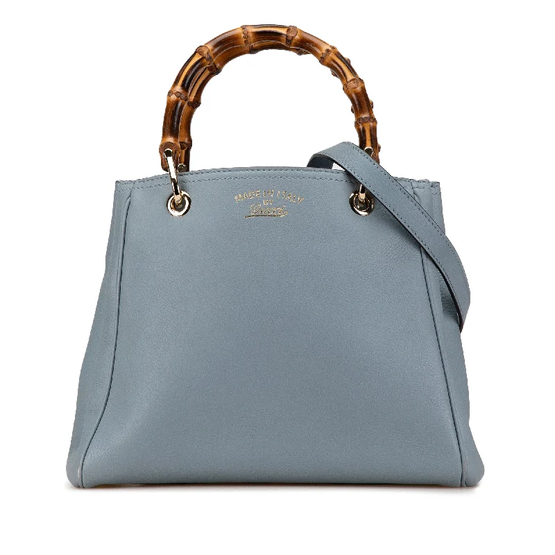 Women Gucci Sylvie bags featuring the signature web stripeBlue Gucci Small Bamboo Shopper Satchel