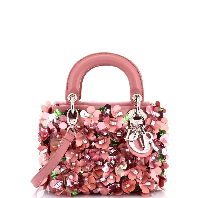 Christian Dior Saddle bags with a studded trim for a bold lookLady Dior Flower Charm Bag Embellished Leather Mini