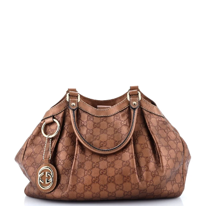 Women Gucci Sylvie bags with a crystal - embellished web stripeSukey Tote Guccissima Leather Medium