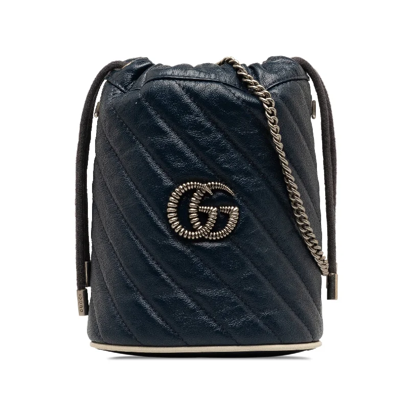 Gucci Marmont bags for women with a contrast - colored interiorNavy Gucci Mini Torchon GG Marmont Bucket Bag