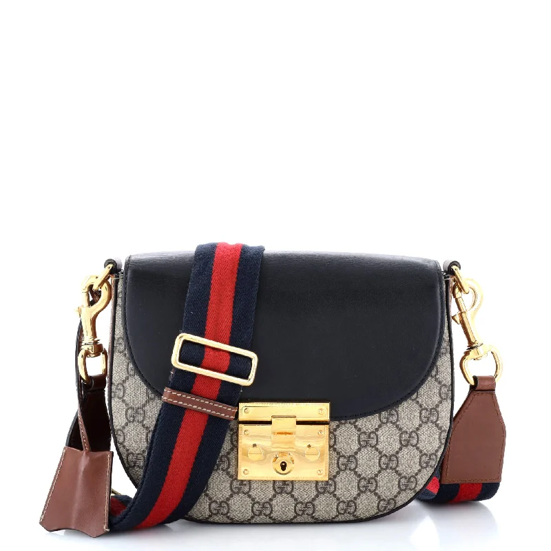 Women Gucci Sylvie bags with a detachable ribbon detailPadlock Saddle Shoulder Bag GG Coated Canvas and Leather Medium