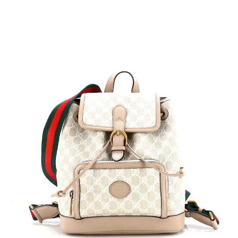 Women Gucci Sylvie bags with a monogram - embossed leatherInterlocking G Patch Drawstring Flap Backpack GG Coated Canvas Small