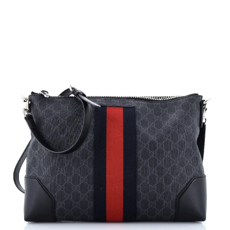 Women Gucci Sylvie bags with a leather - wrapped handleWeb Zip Flat Messenger GG Coated Canvas Medium