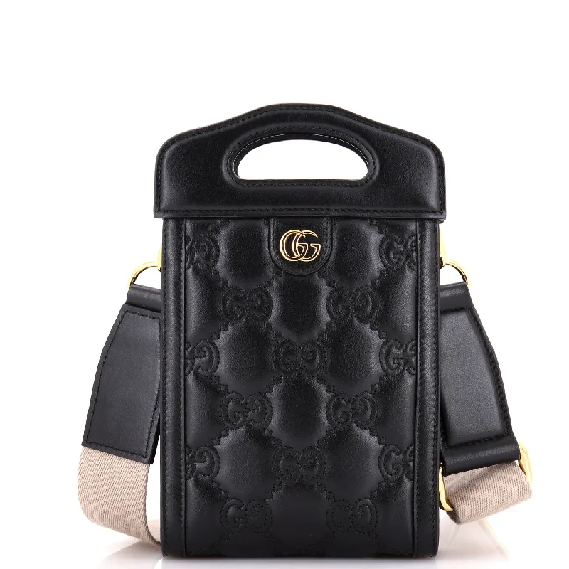 Women Gucci bags with a chain - link trim and a leather bodyTop Handle Crossbody Bag GG Matelasse Leather Mini