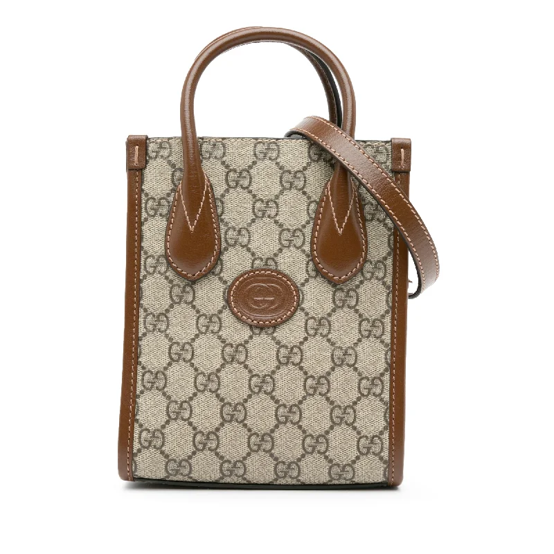 Women Gucci bags with a chain - link trim and a leather bodyBrown Gucci Mini GG Supreme Interlocking G Satchel