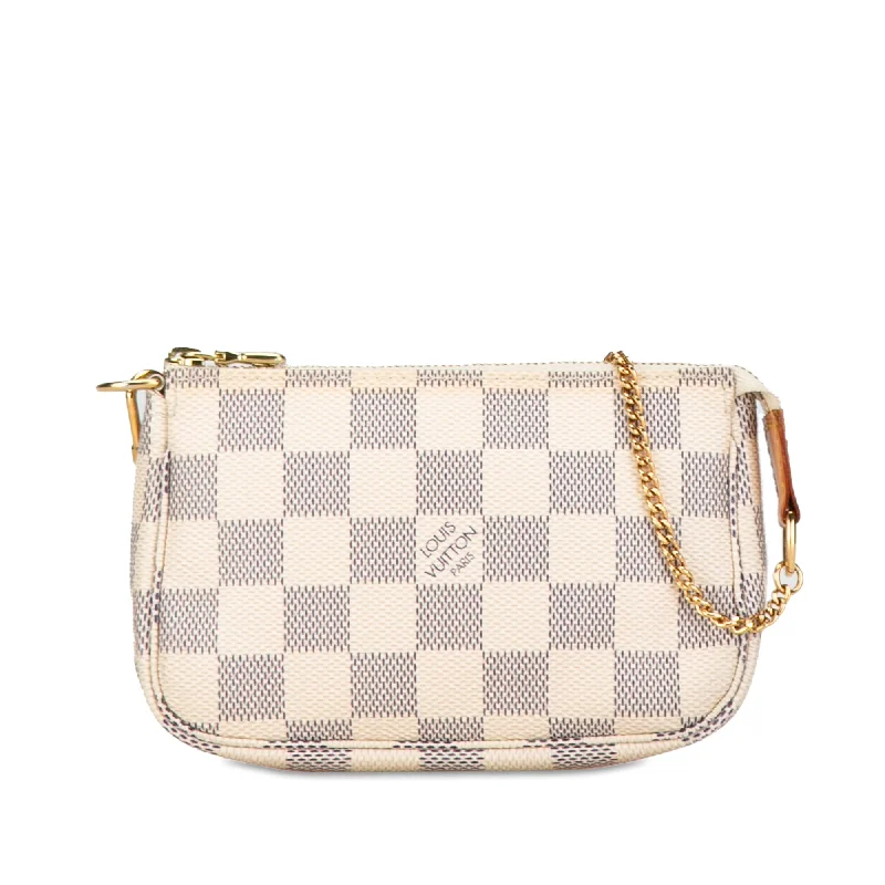 Louis Vuitton Twist bags with the iconic LV - turnlock closureWhite Louis Vuitton Damier Azur Mini Pochette Accessoires Handbag