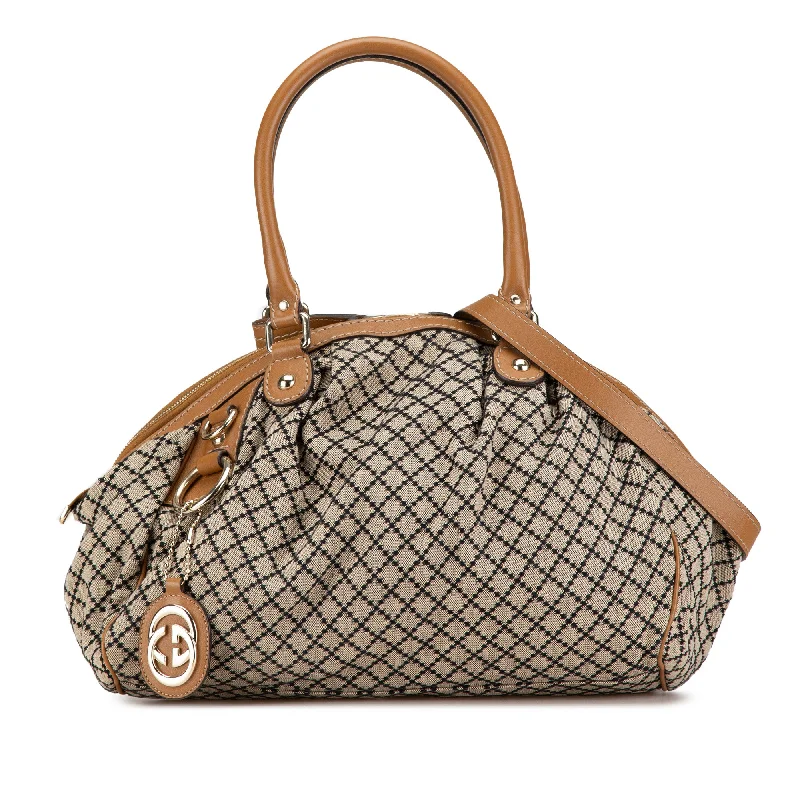 Women Gucci Sylvie bags with a leather - wrapped handleBrown Gucci Diamante Canvas Sukey Satchel