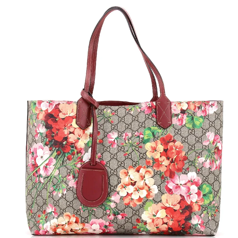 Women Gucci tote bags in GG Supreme canvas for a branded feelReversible Tote Blooms GG Print Leather Medium