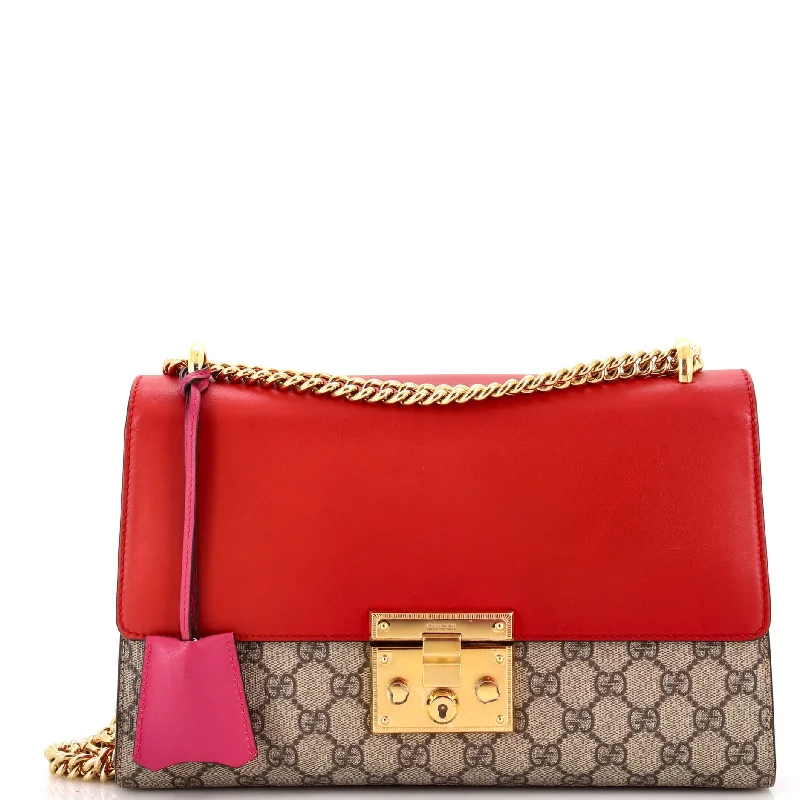 Women Gucci Sylvie bags with a leather - wrapped handlePadlock Shoulder Bag GG Coated Canvas and Leather Medium