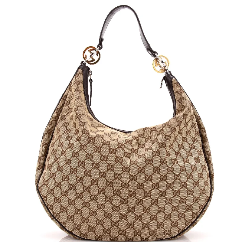 Women Gucci bags with a magnetic snap closure for easy accessTwins Hobo GG Canvas Medium