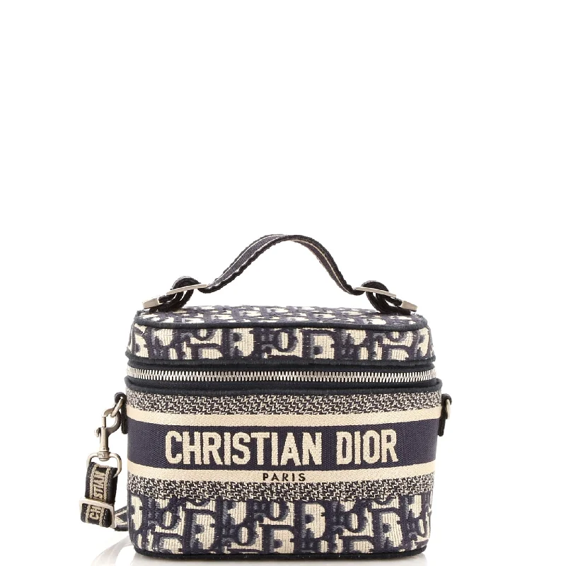 Christian Dior tote bags with a printed Dior logo on the frontDiorTravel Convertible Vanity Case Oblique Canvas