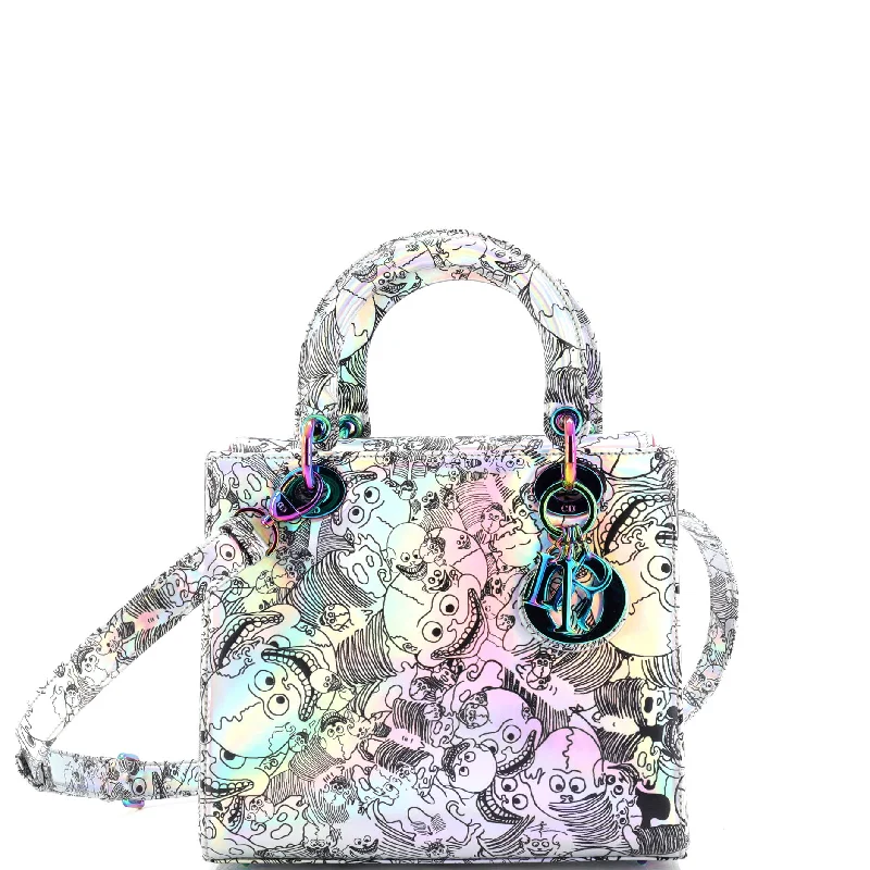 Christian Dior tote bags with a printed Dior logo on the frontLady Dior Art Bag Limited Edition Zhang Huan Metallic Leather Small