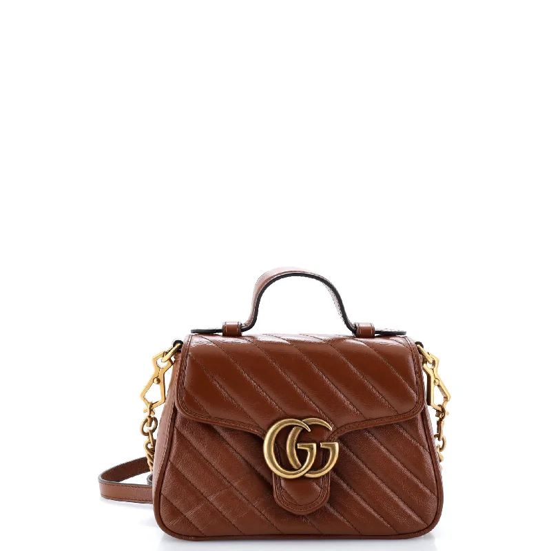 Ladies Gucci Dionysus bags with a star - shaped charmGG Marmont Top Handle Flap Bag Matelasse Leather Mini