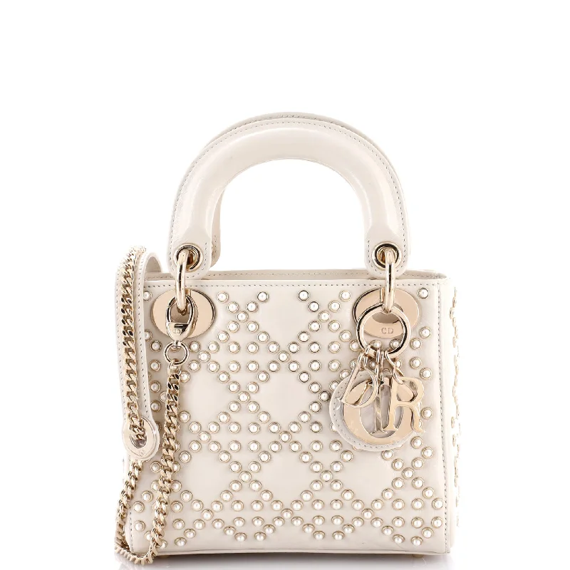 Christian Dior Saddle bags with a studded trim for a bold lookLady Dior Bag Pearl Cannage Studded Lambskin Mini