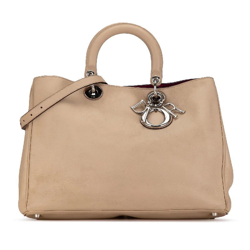 Christian Dior bags with a side - pocket for holding a water bottleTan Dior Large Diorissimo Satchel