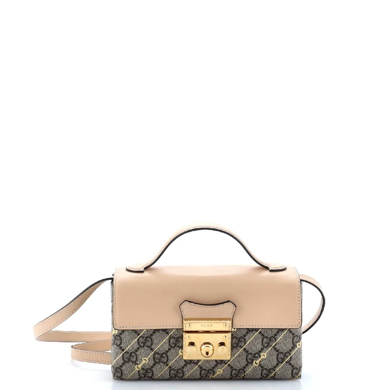 Ladies Gucci Dionysus bags in a pastel colorPadlock Top Handle Bag Printed GG Coated Canvas and Leather Mini