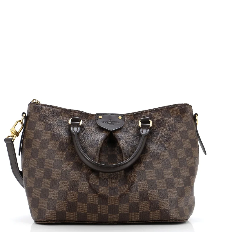 Louis Vuitton Alma bags featuring the signature top - handle designSiena Handbag Damier PM