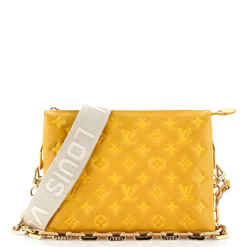 Louis Vuitton Twist bags with a contrast - colored interior for visual interestCoussin Bag Monogram Embossed Lambskin PM