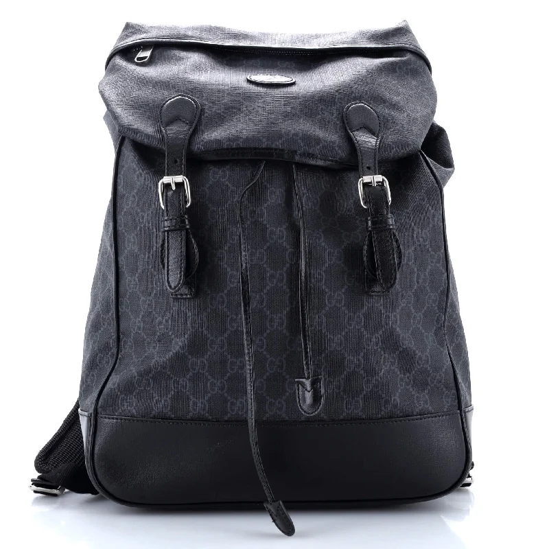 Women Gucci Sylvie bags featuring the signature web stripeInterlocking G Patch Drawstring Flap Backpack GG Coated Canvas Medium