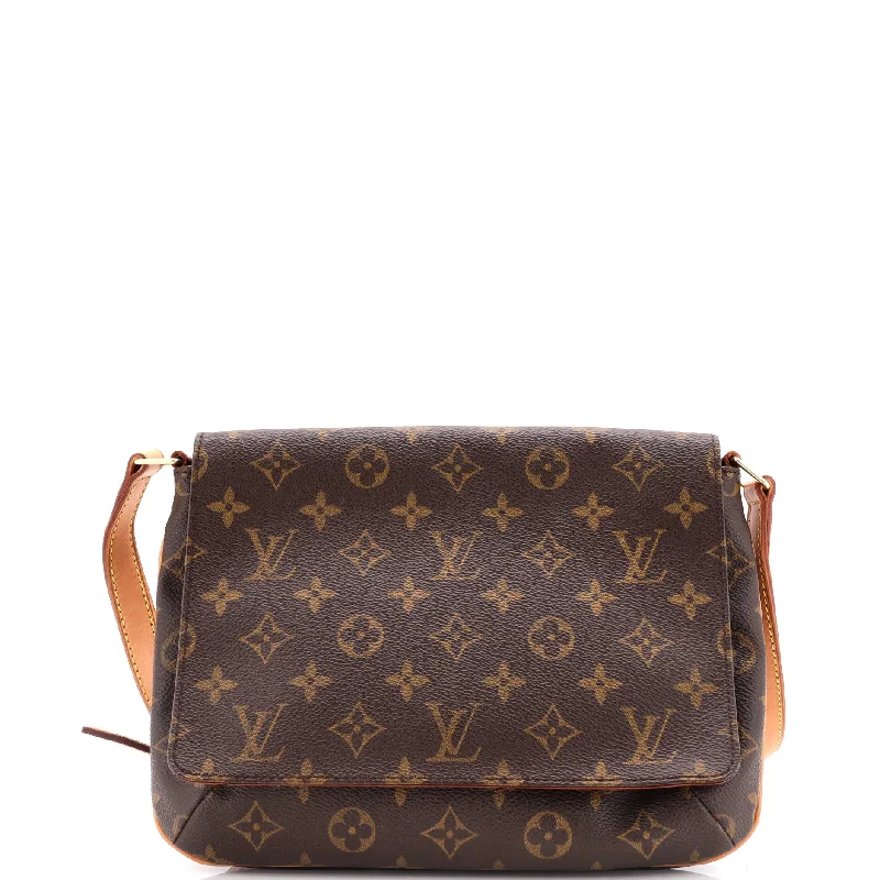 Louis Vuitton Twist bags with a contrast - colored interior for visual interestMusette Tango Handbag Monogram Canvas