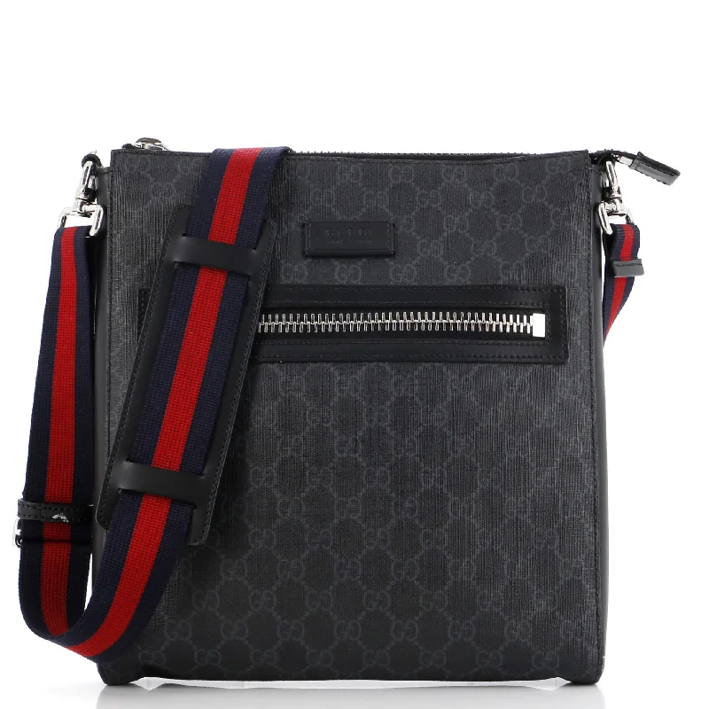 Women Gucci bags with a snap - button closure and a decorative charmWeb Strap Front Zip Messenger Bag GG Coated Canvas Medium