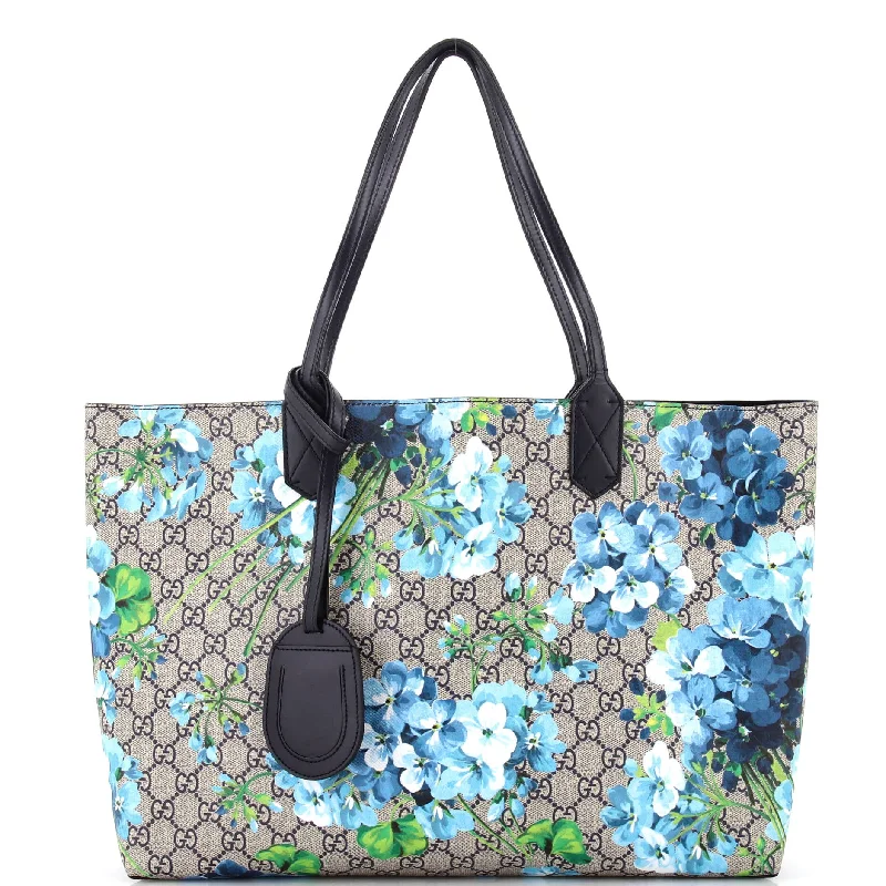 Women Gucci Sylvie bags with a crystal - embellished web stripeReversible Tote Blooms GG Print Leather Medium