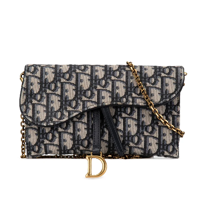 Christian Dior tote bags with a printed Dior logo on the frontBlue Dior Oblique Saddle Wallet On Chain Crossbody Bag