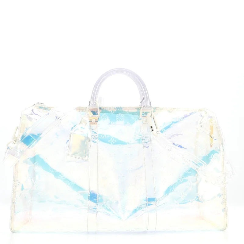 Ladies Louis Vuitton Petite Malle bags in a pastel color for a soft lookKeepall Bandouliere Bag Limited Edition Monogram Prism PVC 50