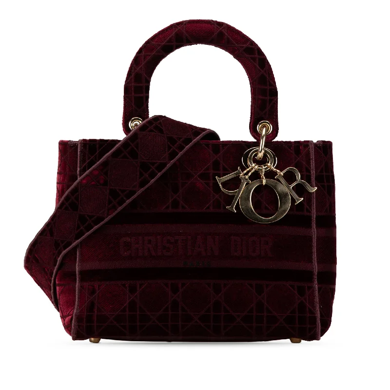 Christian Dior Saddle bags with a studded trim for a bold lookRed Dior Medium Velvet Cannage Lady D Lite Satchel