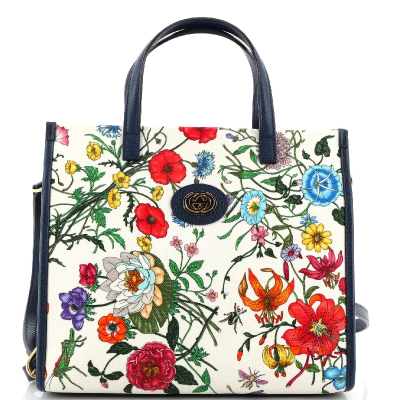 Women Gucci bags with a snap - button closure and a decorative charmConvertible Tote Flora Canvas Medium