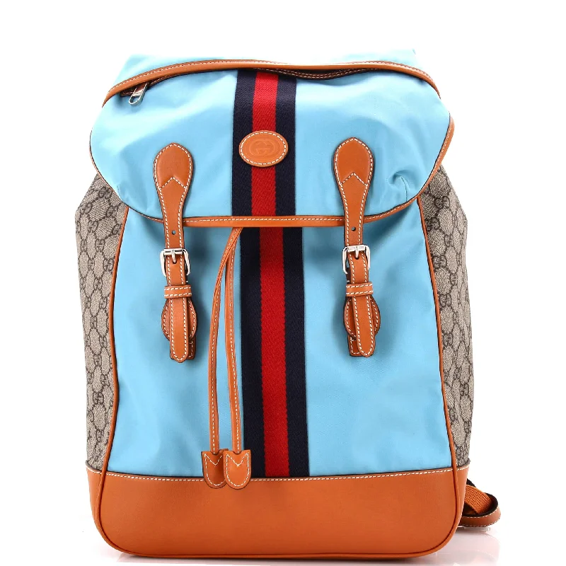 Women Gucci crossbody bags with a woven leather strapInterlocking G Patch Flap Buckle Backpack Nylon and GG Coated Canvas