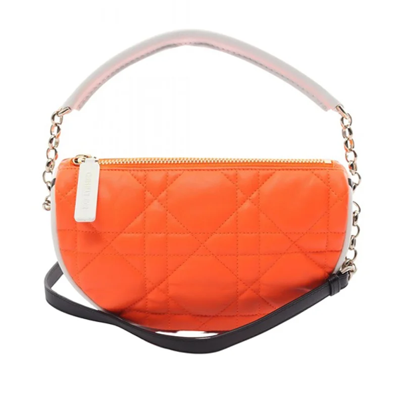 Christian Dior bags with a side - pocket for holding a water bottleOrange Dior Small Lambskin Cannage Dior Vibe Hobo Satchel