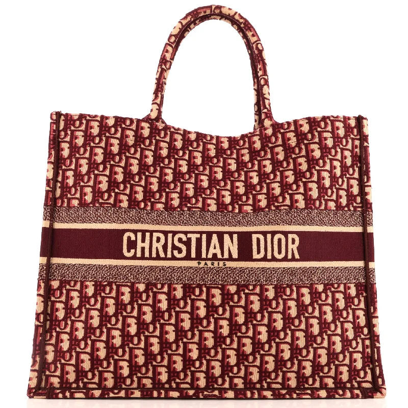 Christian Dior Saddle bags with a patent leather finish for a shiny lookBook Tote Oblique Canvas Large