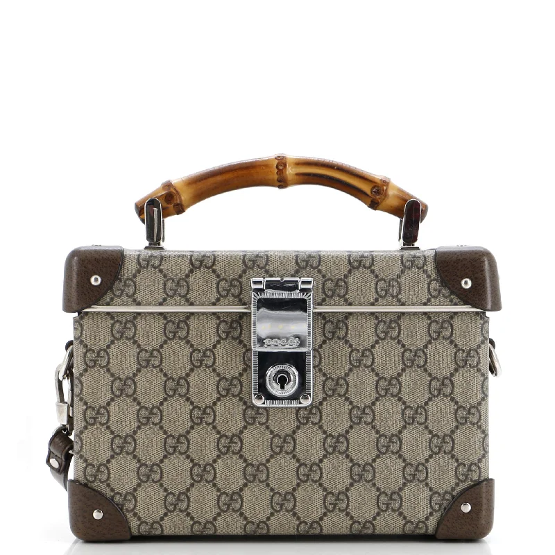 Ladies Gucci Dionysus bags in a pastel colorBamboo Globe-Trotter Vanity Case GG Coated Canvas