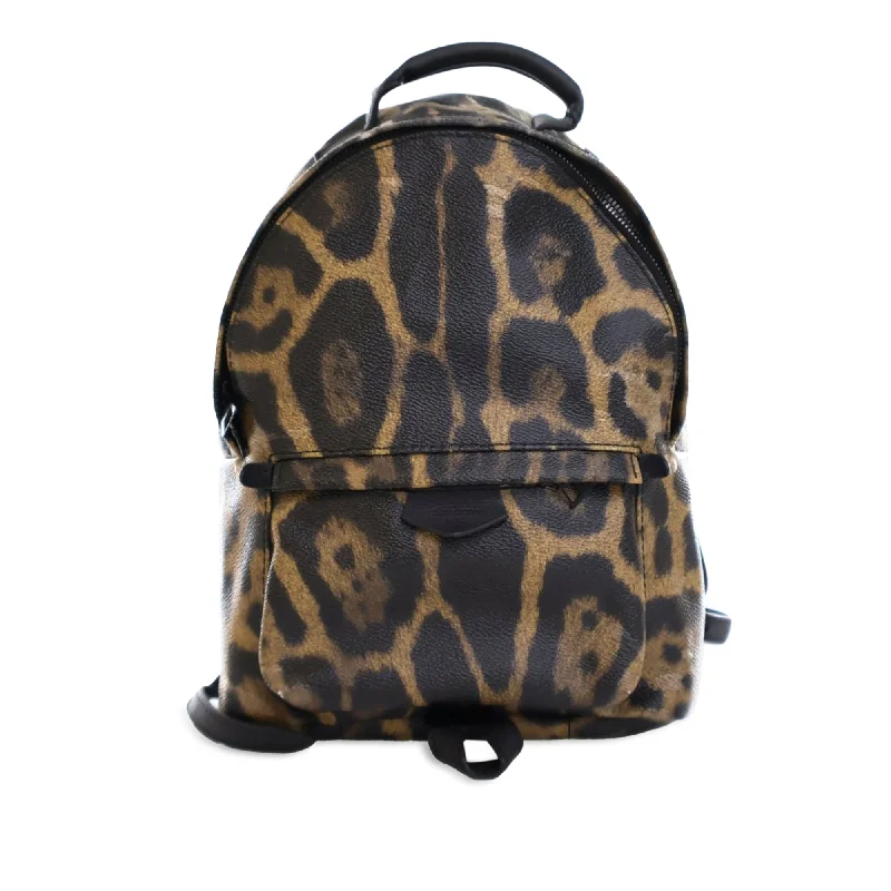 Louis Vuitton Twist bags with a crystal - embellished LV - turnlockBrown Louis Vuitton Wild Animal Palm Springs PM Backpack