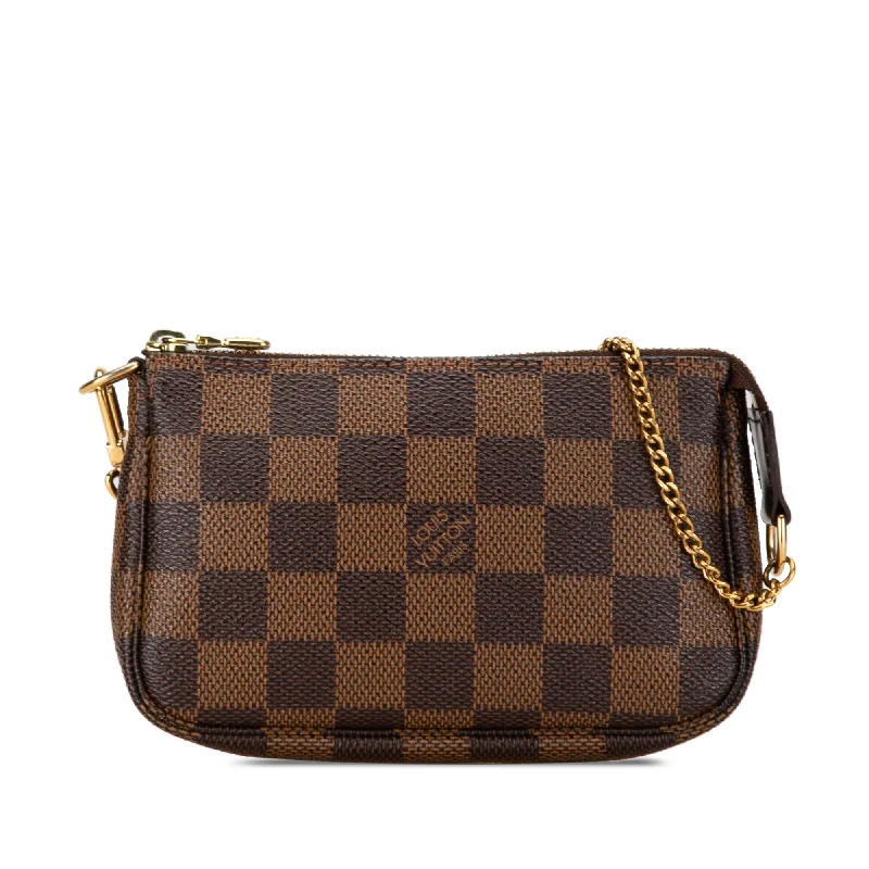 Louis Vuitton tote bags with a spacious interior and multiple pocketsBrown Louis Vuitton Damier Ebene Mini Pochette Accessoires Handbag