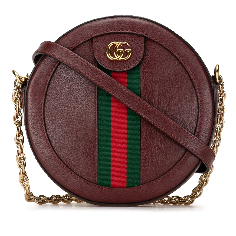 Women Gucci Sylvie bags featuring the signature web stripeRed Gucci Mini Round Ophidia Leather Crossbody Bag