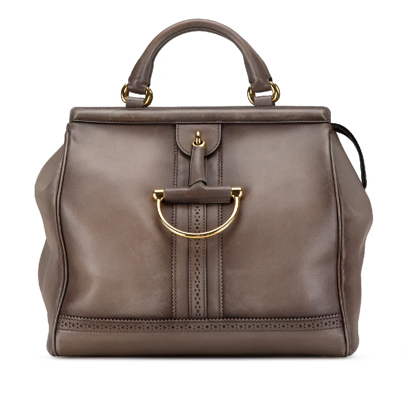 Ladies Gucci shoulder bags with a tassel decorationBrown Gucci Duilio Brogue Horsebit Handbag