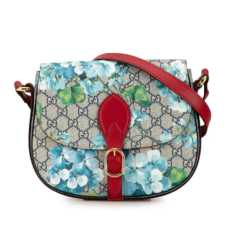 Gucci Marmont bags for women with a contrast - colored interiorBrown Gucci GG Supreme Blooms Crossbody