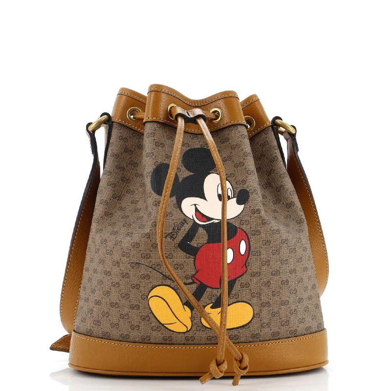 Women Gucci Sylvie bags with a crystal - embellished web stripeDisney Mickey Mouse Bucket Bag Printed Mini GG Coated Canvas