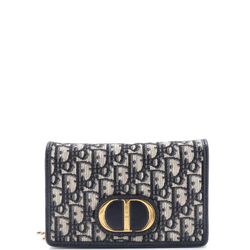 Christian Dior handbags with a removable shoulder strap for versatility30 Montaigne 2-in-1 Pouch Oblique Canvas