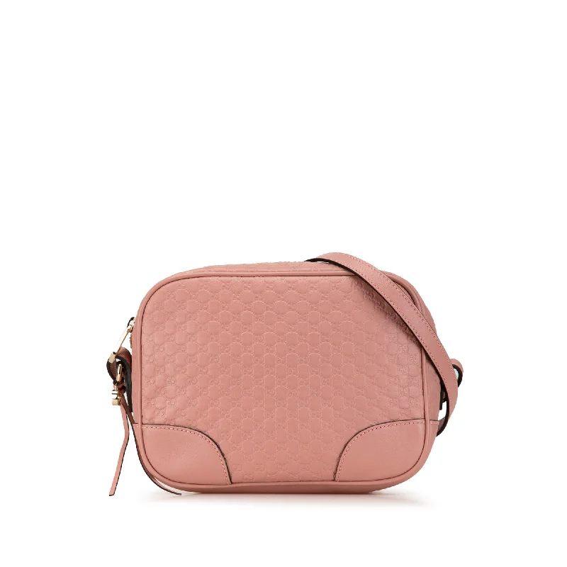 Women Gucci bags with a chain - link trim and a leather bodyPink Gucci Microguccissima Bree Crossbody