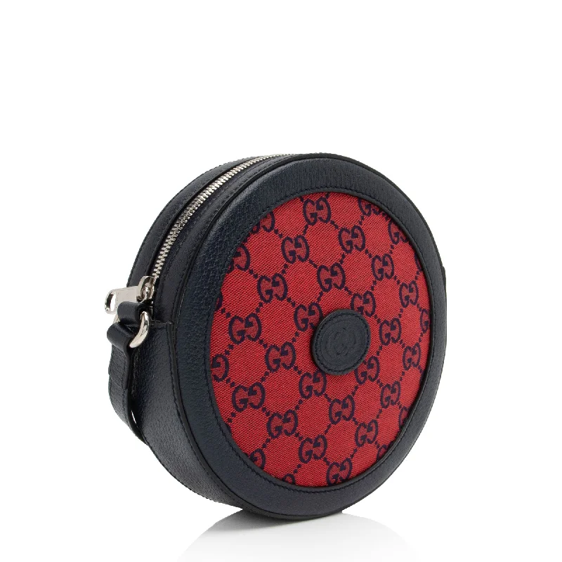 Gucci Marmont bags for women with a contrast - colored interiorGucci GG Canvas Interlocking G Patch Round Shoulder Bag (nexagL)