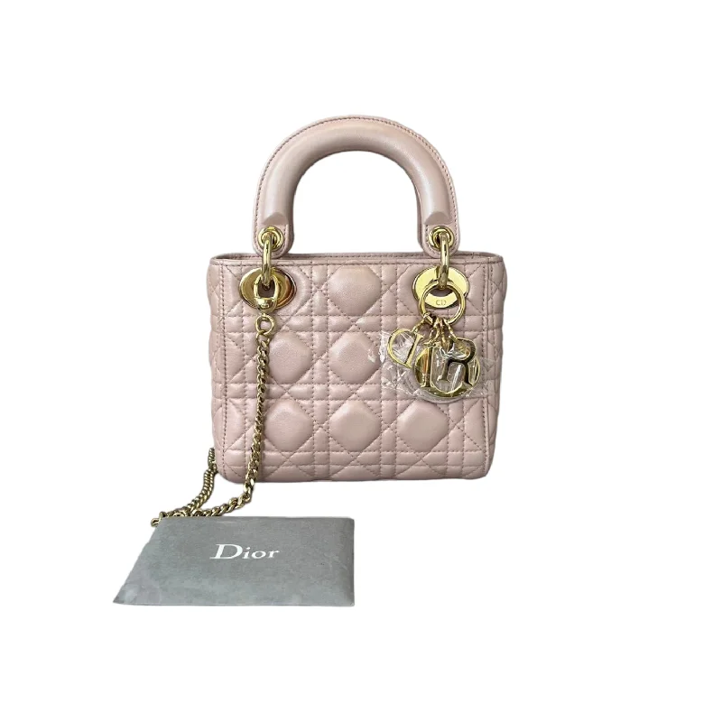 Christian Dior tote bags with a printed Dior logo on the frontMini Lady Dior in Baby Pearly Pink LGHW