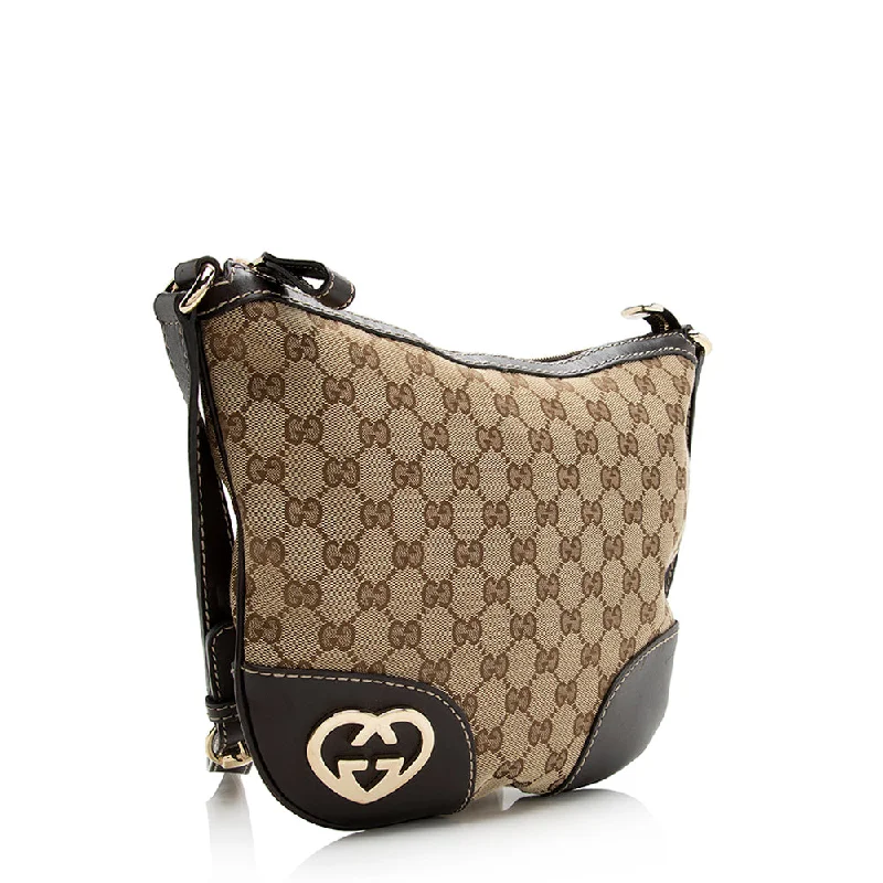 Gucci backpacks for women with a hidden back pocketGucci GG Canvas Interlocking Heart Crossbody Bag (21469)