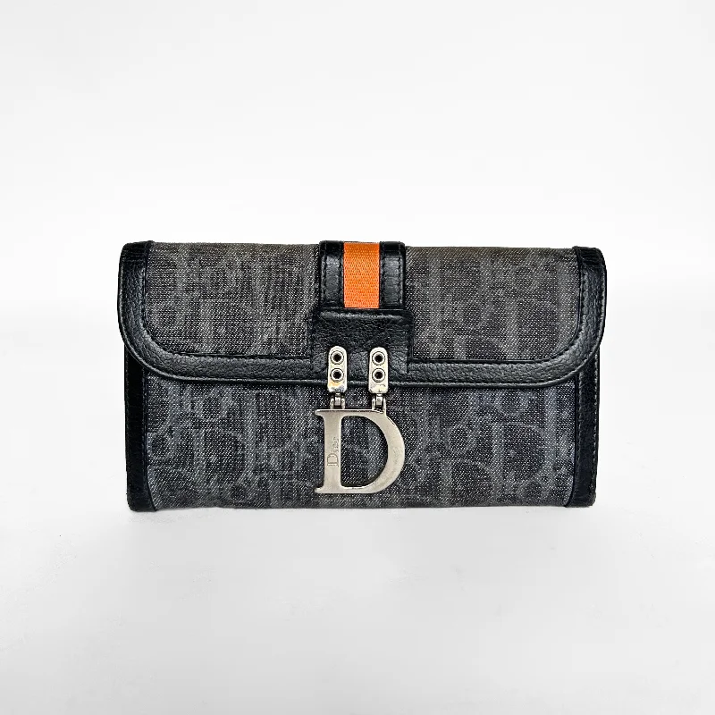 Christian Dior Saddle bags with a patent leather finish for a shiny lookDior Wallet Monogram Canvas